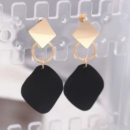 Boucles rétro vernis
